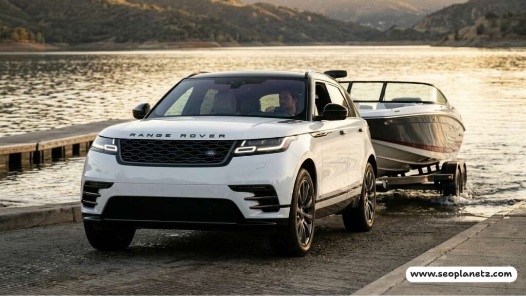 Range Rover Velar towing boat trailer boat ramp terrain response