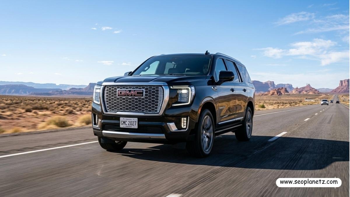 2027 GMC Yukon Denali in Onyx Black Metallic on desert highway at golden hour